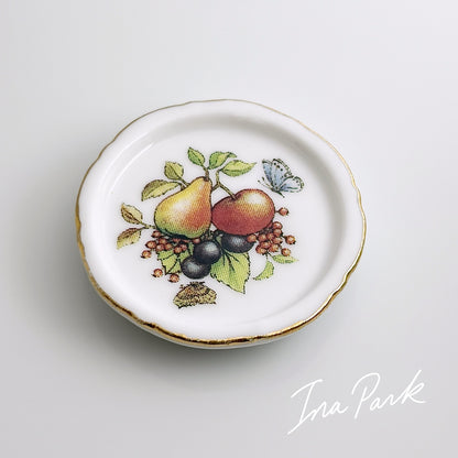 金彩縁の果物の絵皿のフェーブ