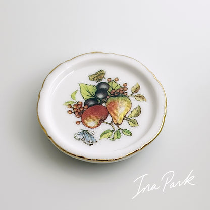 金彩縁の果物の絵皿のフェーブ