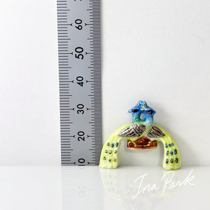 ２匹の孔雀のフェーブ
